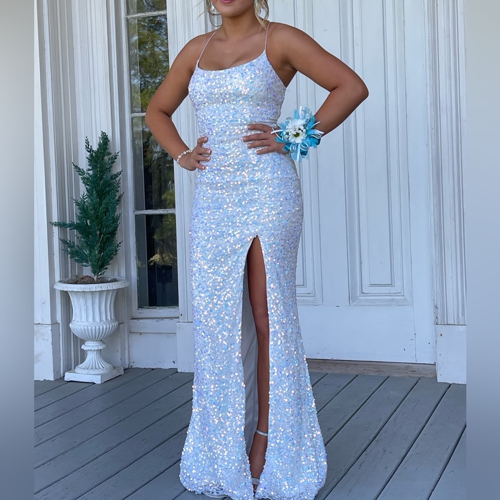 White holographic prom dress. Only worn for four hours. In good condition.